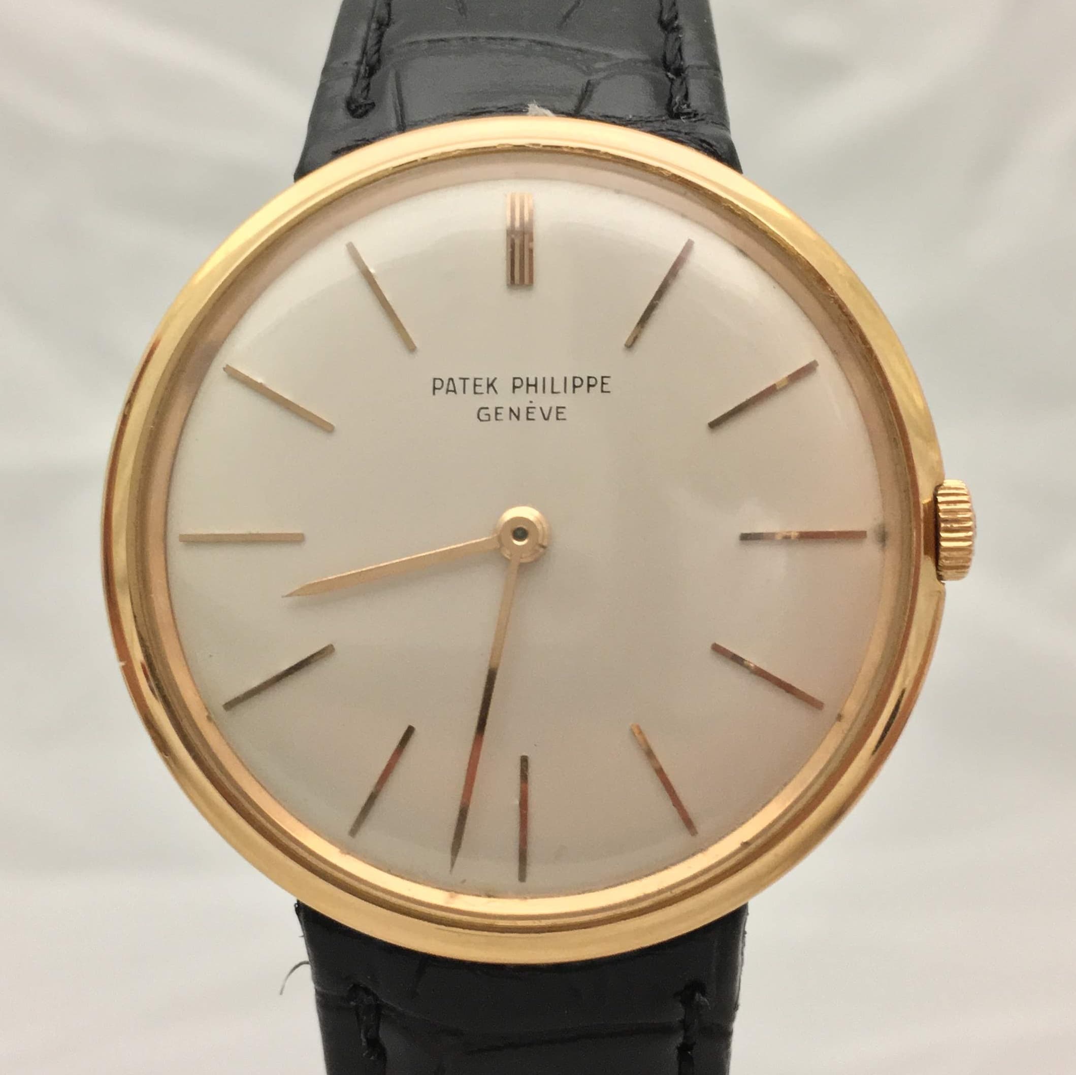 Reloj Patek Philippe Ref. 2591 en oro amarillo con esfera plateada y correa negra en Joyería Recoleta