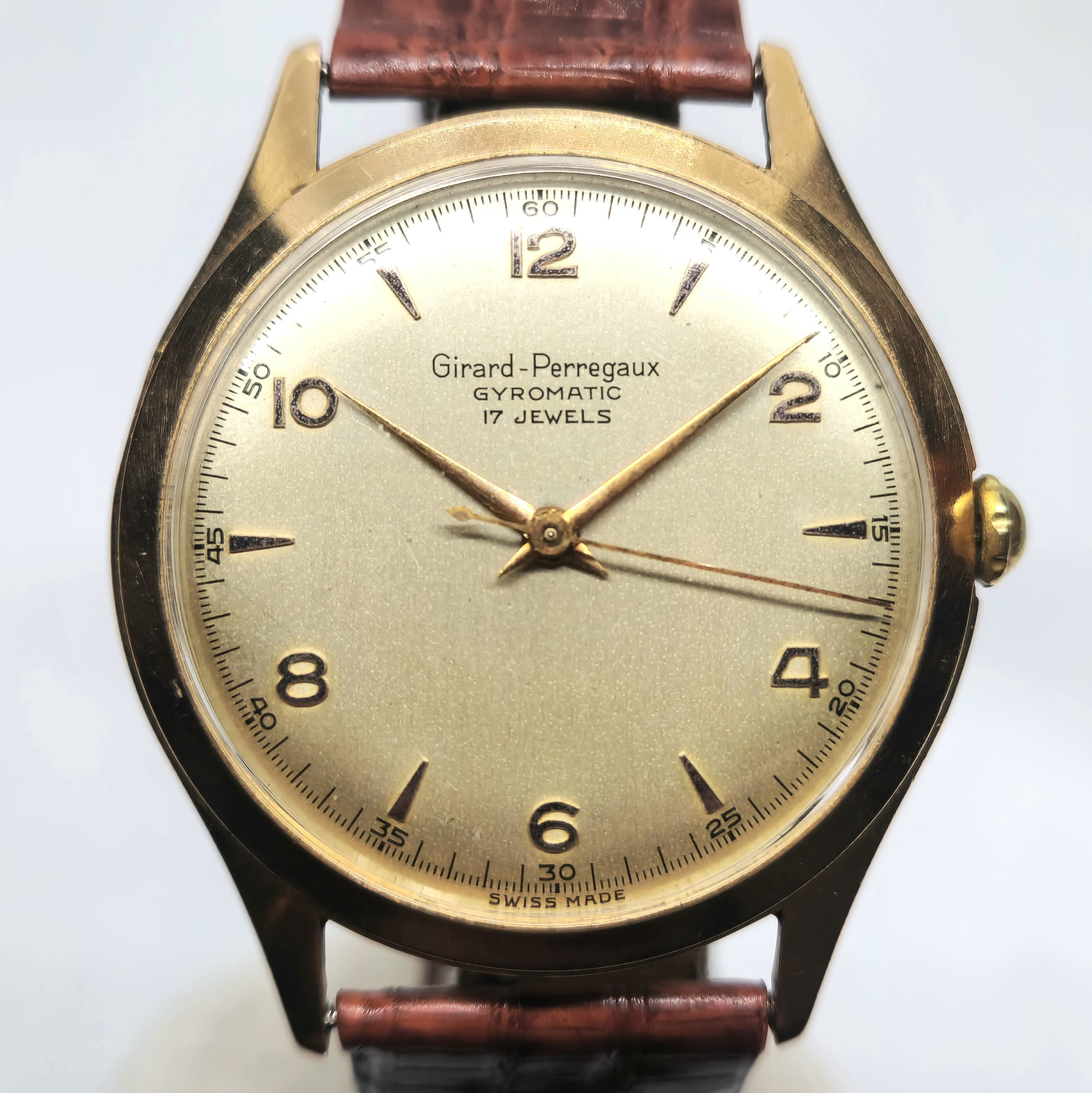 Reloj Girard-Perregaux Gyromatic vintage dorado 17 jewels con correa marrón en Joyería Recoleta