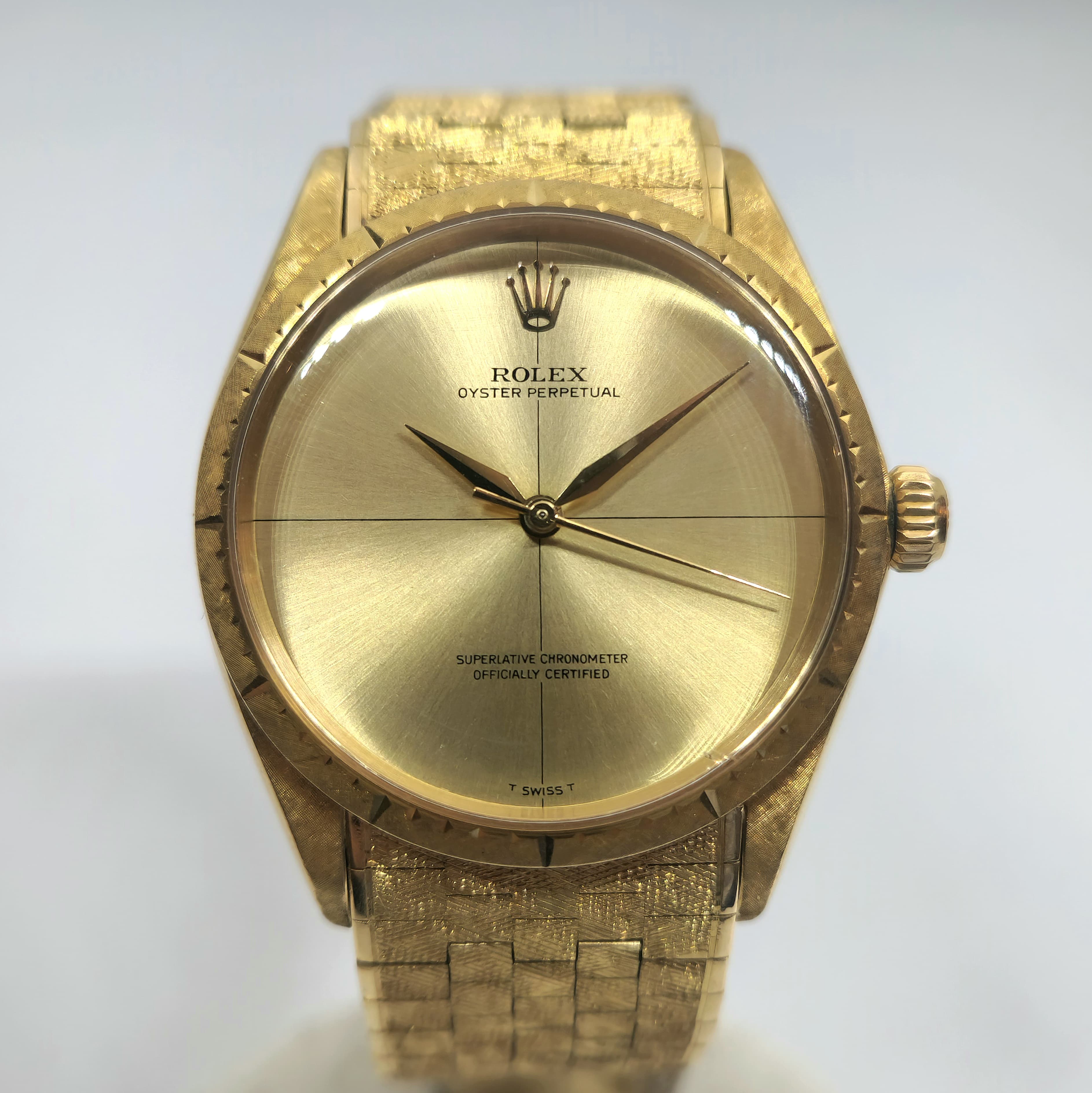 Reloj Rolex Oyster Perpetual ref. 1009 en oro amarillo con esfera champagne en Joyería Recoleta
