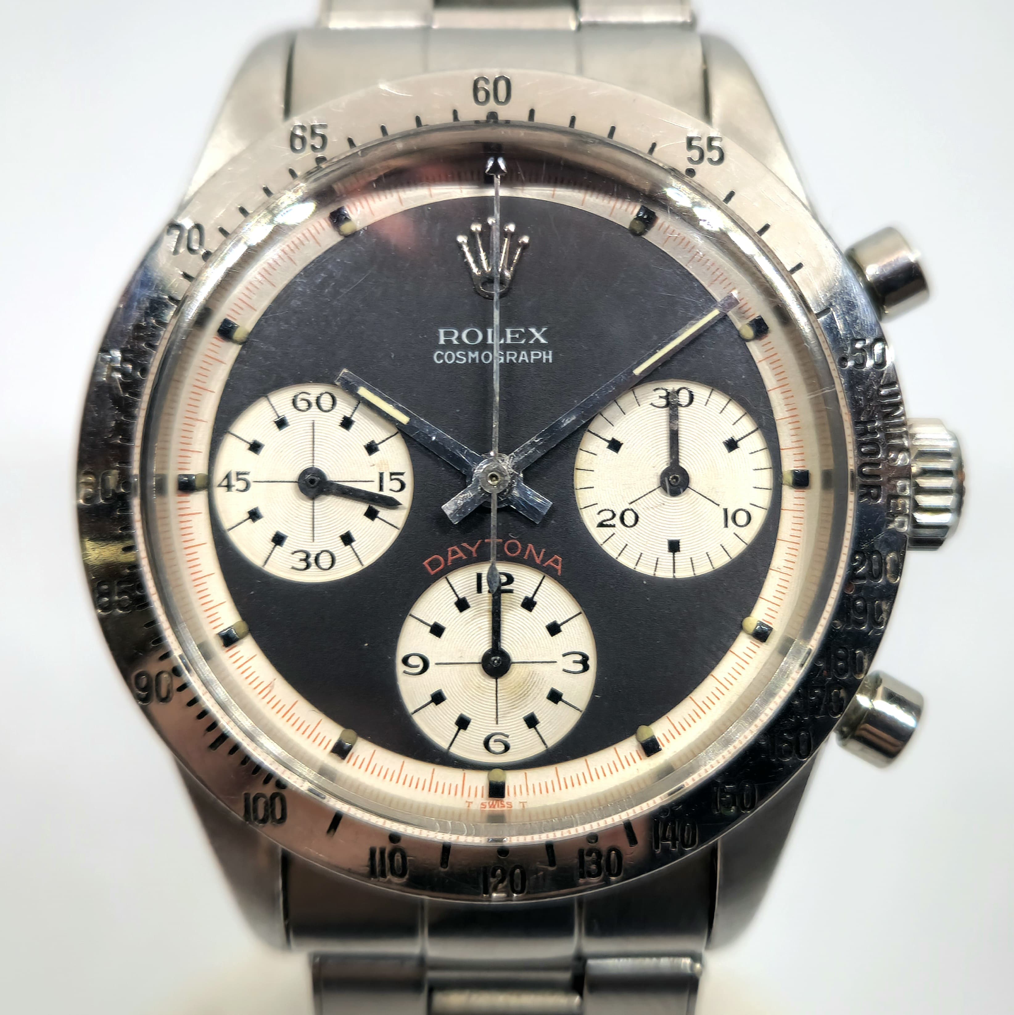 Reloj cronógrafo Rolex Daytona ref. 6239 Paul Newman en acero inoxidable con esfera negra y subdiales crema en Joyería Recoleta.