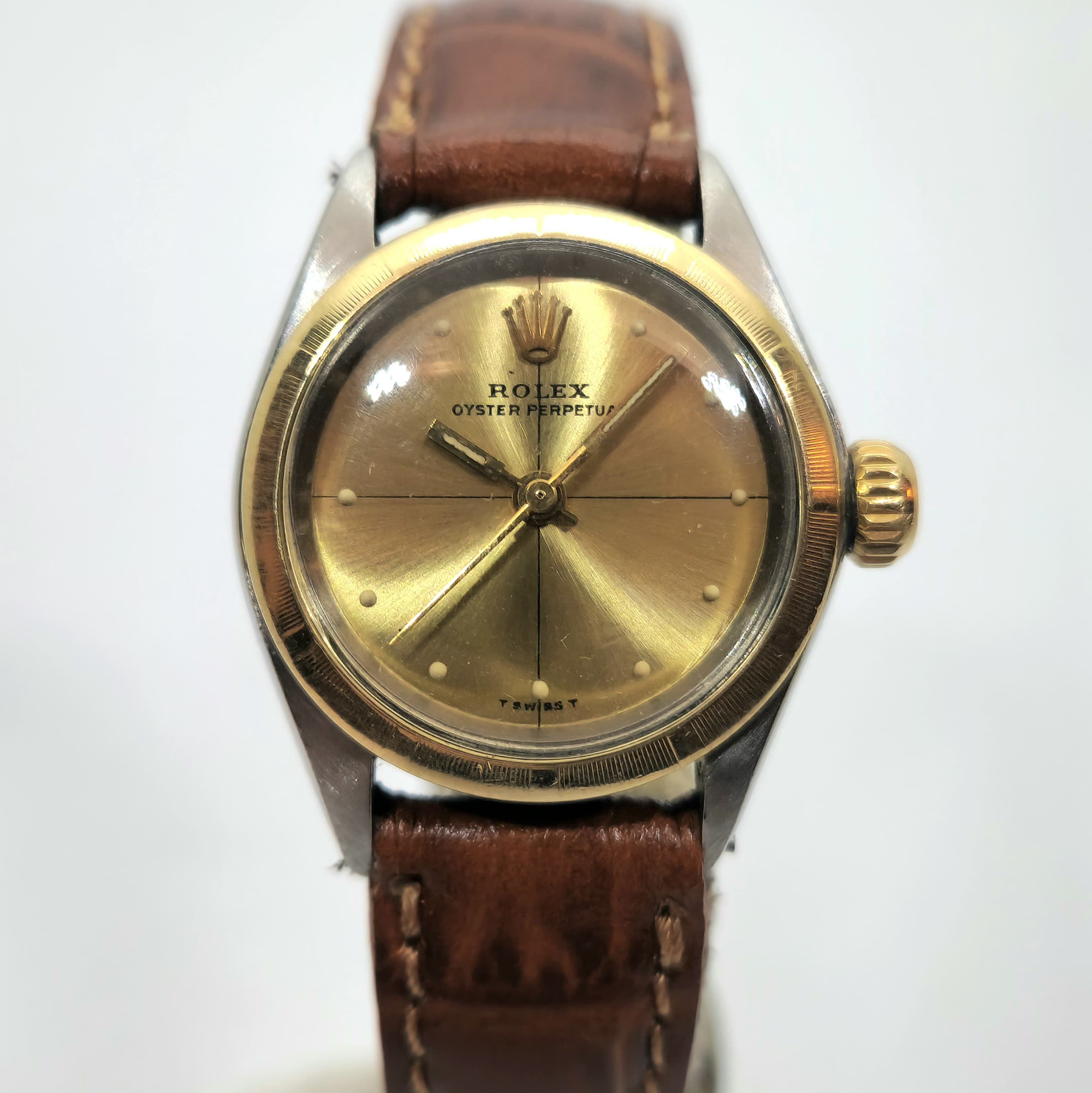 Reloj Rolex Oyster Perpetual vintage bicolor acero y oro con esfera champagne y correa de cuero marrón en Joyería Recoleta
