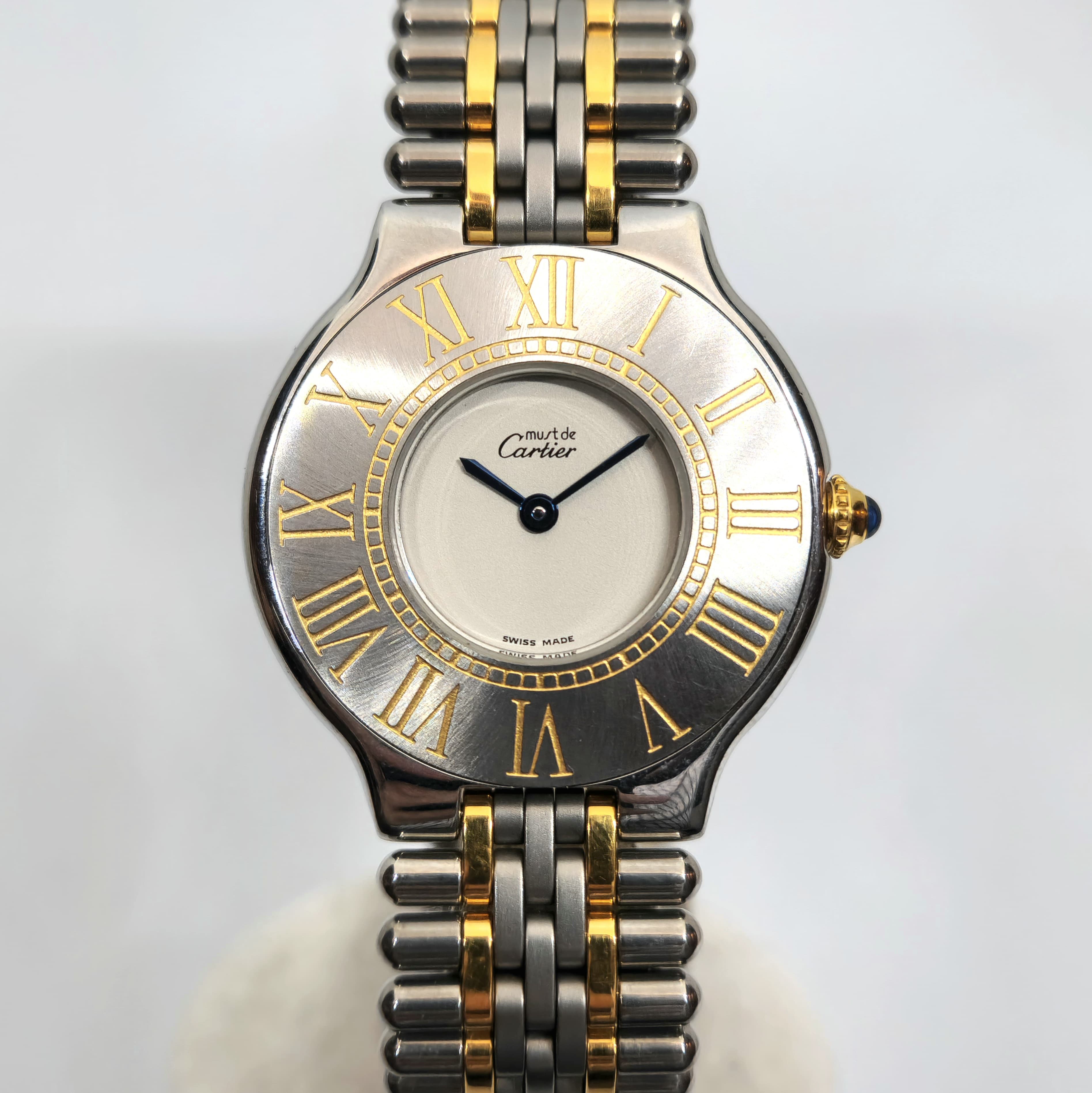 Reloj Must de Cartier 21 bicolor acero y oro amarillo con números romanos, pulsera grano de arroz, en Joyería Recoleta.