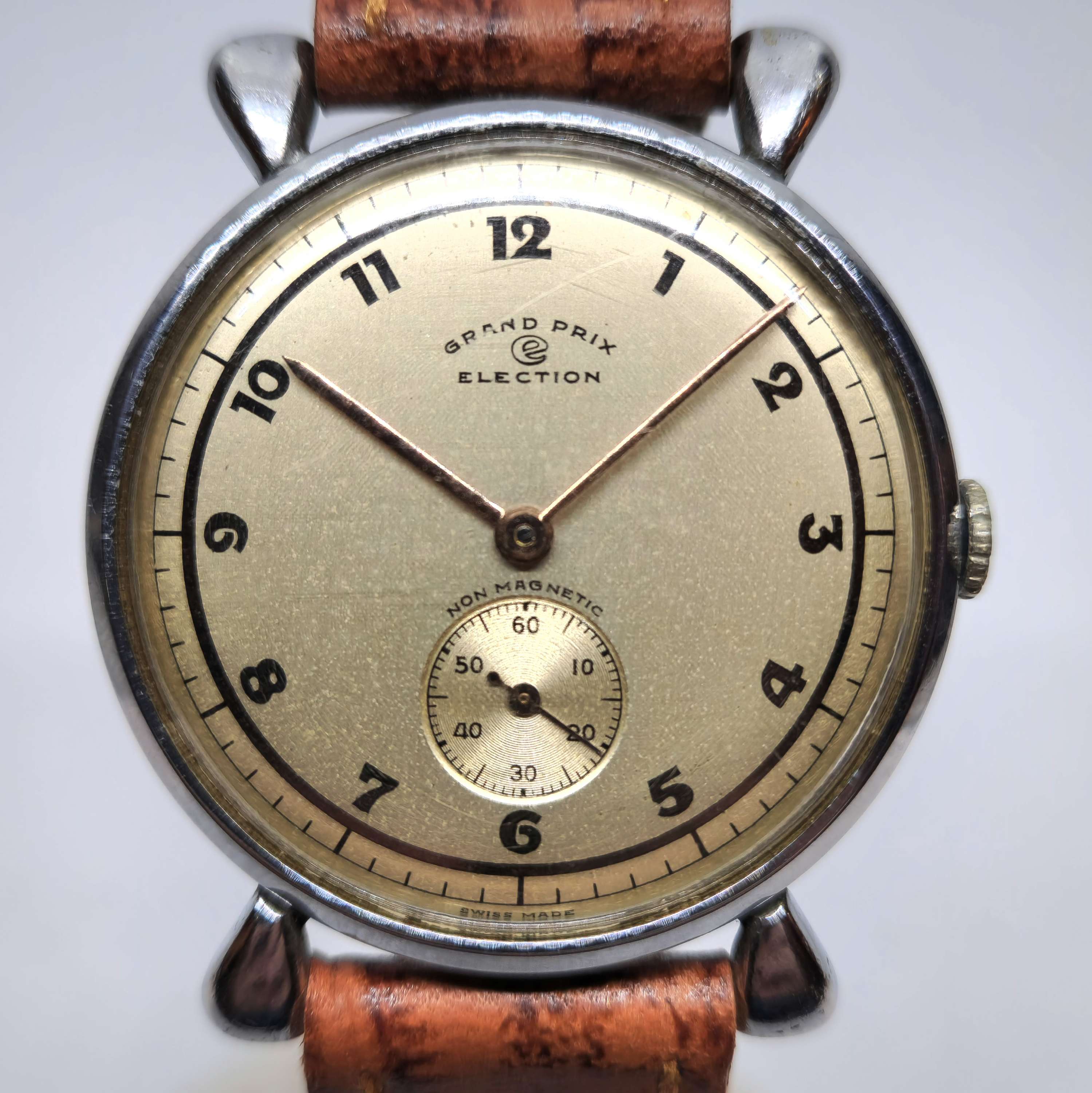 Reloj vintage Election Grand Prix acero Swiss Made años 50 con segundero auxiliar en Joyería Recoleta