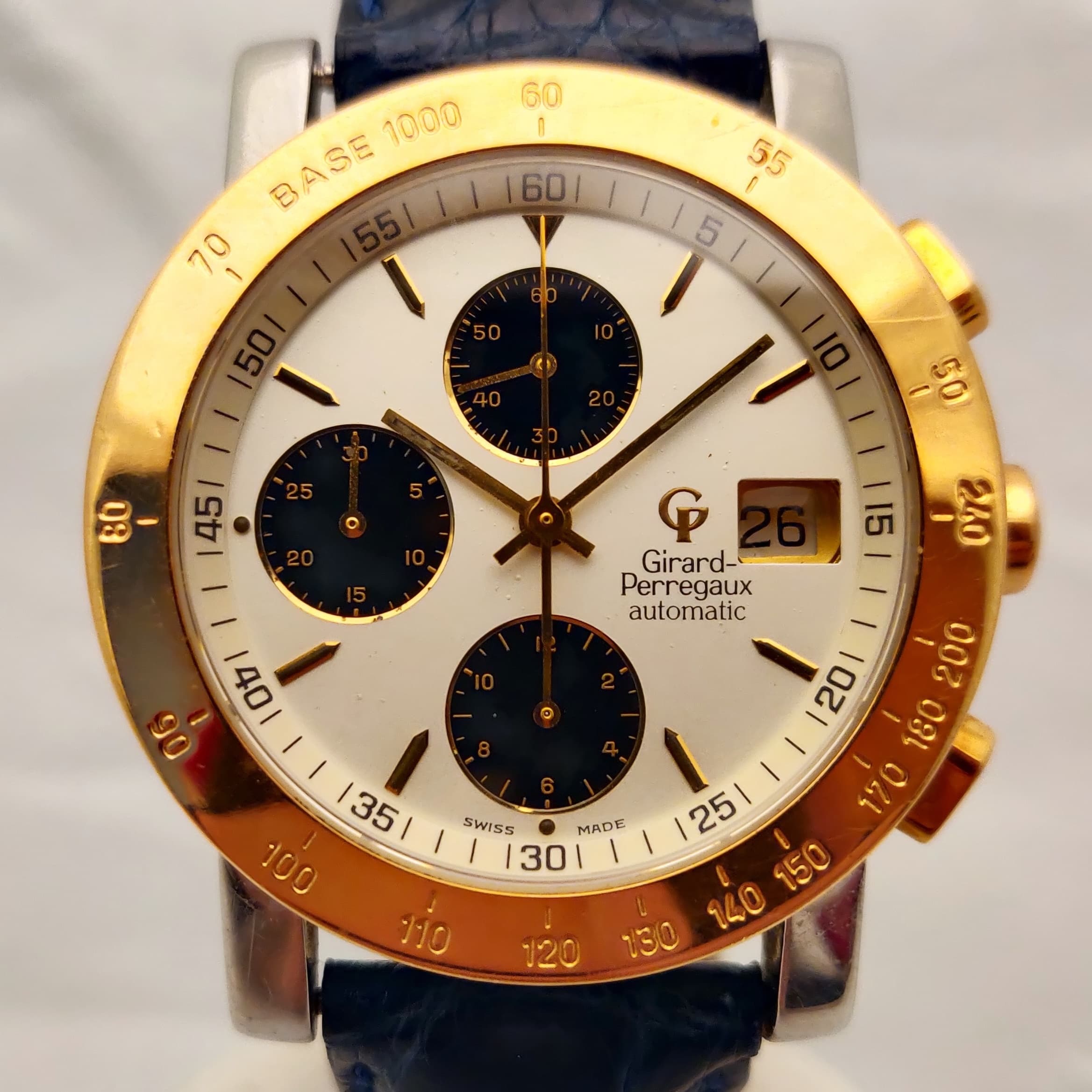 Reloj Girard Perregaux Ref. 7000 automático bicolor oro amarillo y acero con cronógrafo y malla azul en Joyería Recoleta