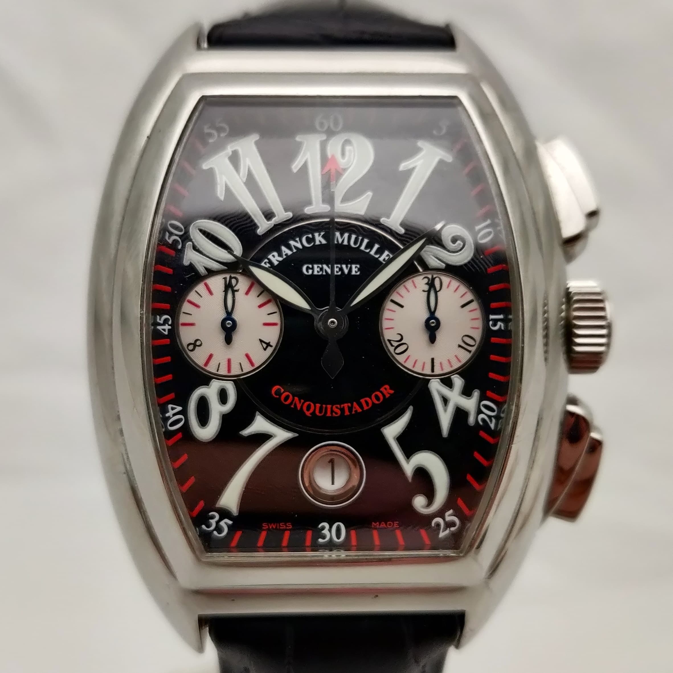 Reloj Franck Muller Conquistador cronógrafo en acero inoxidable con esfera negra y números arábigos blancos en Joyería Recoleta