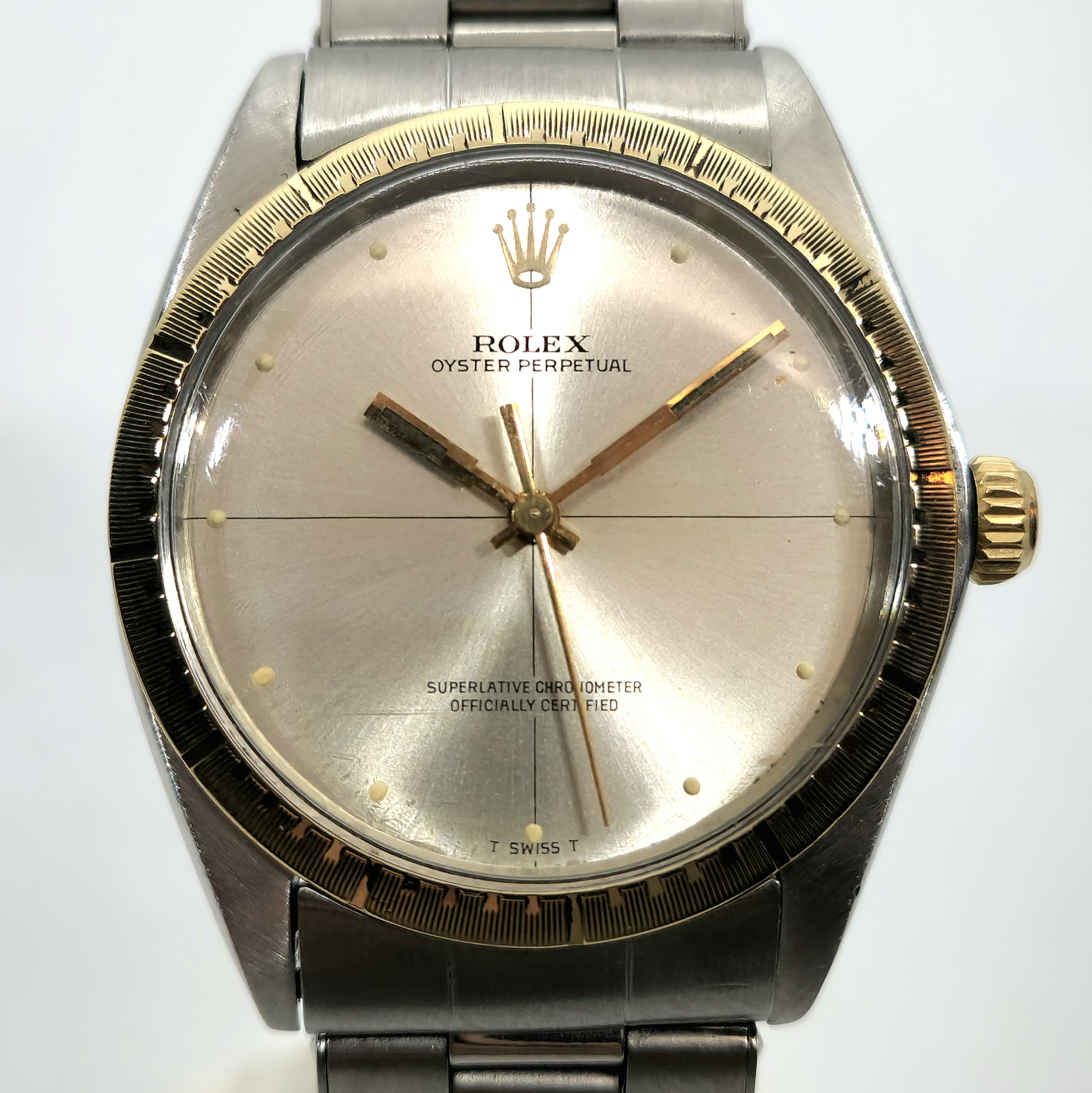 Reloj Rolex Oyster Perpetual ref. 1038 acero y oro vintage con esfera plateada en Joyería Recoleta