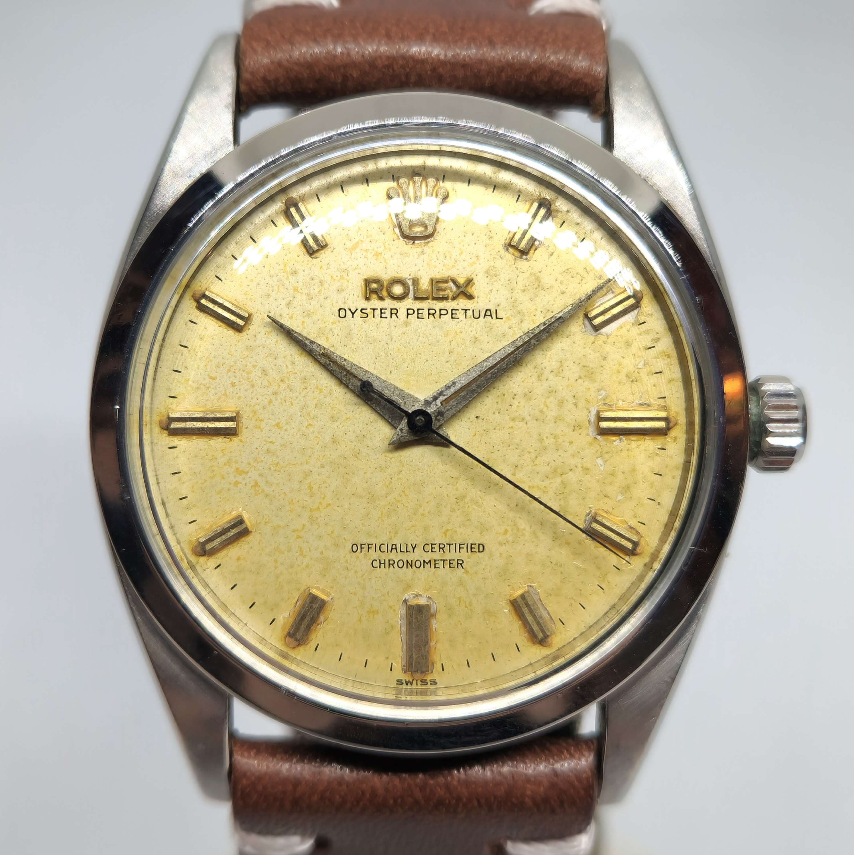 Reloj Rolex Oyster Perpetual vintage acero con esfera patinada dorada y malla cuero en Joyería Recoleta