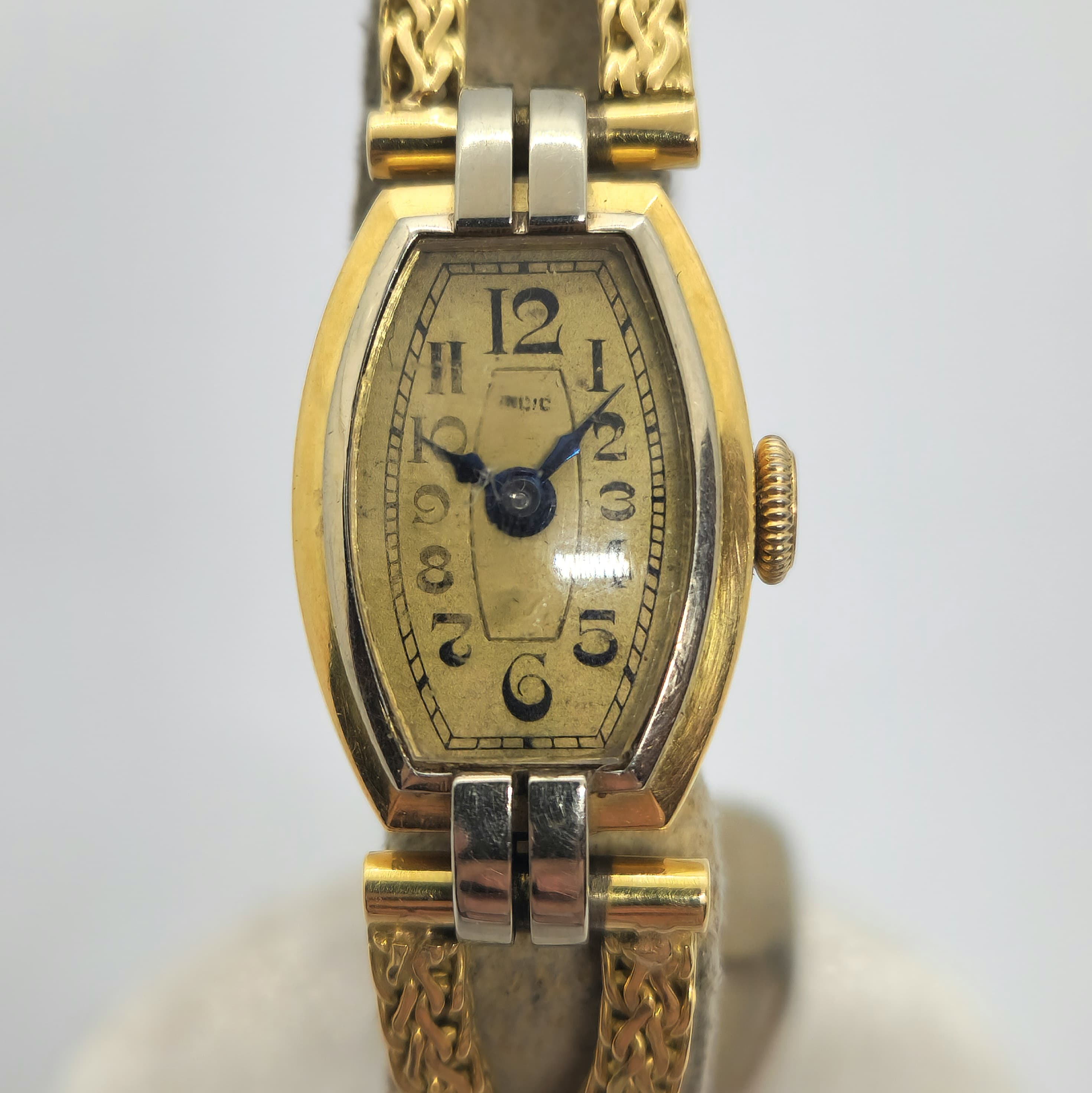 Reloj Art Deco dama caja bicolor oro y plata con pulsera trenzada dorada en Joyería Recoleta