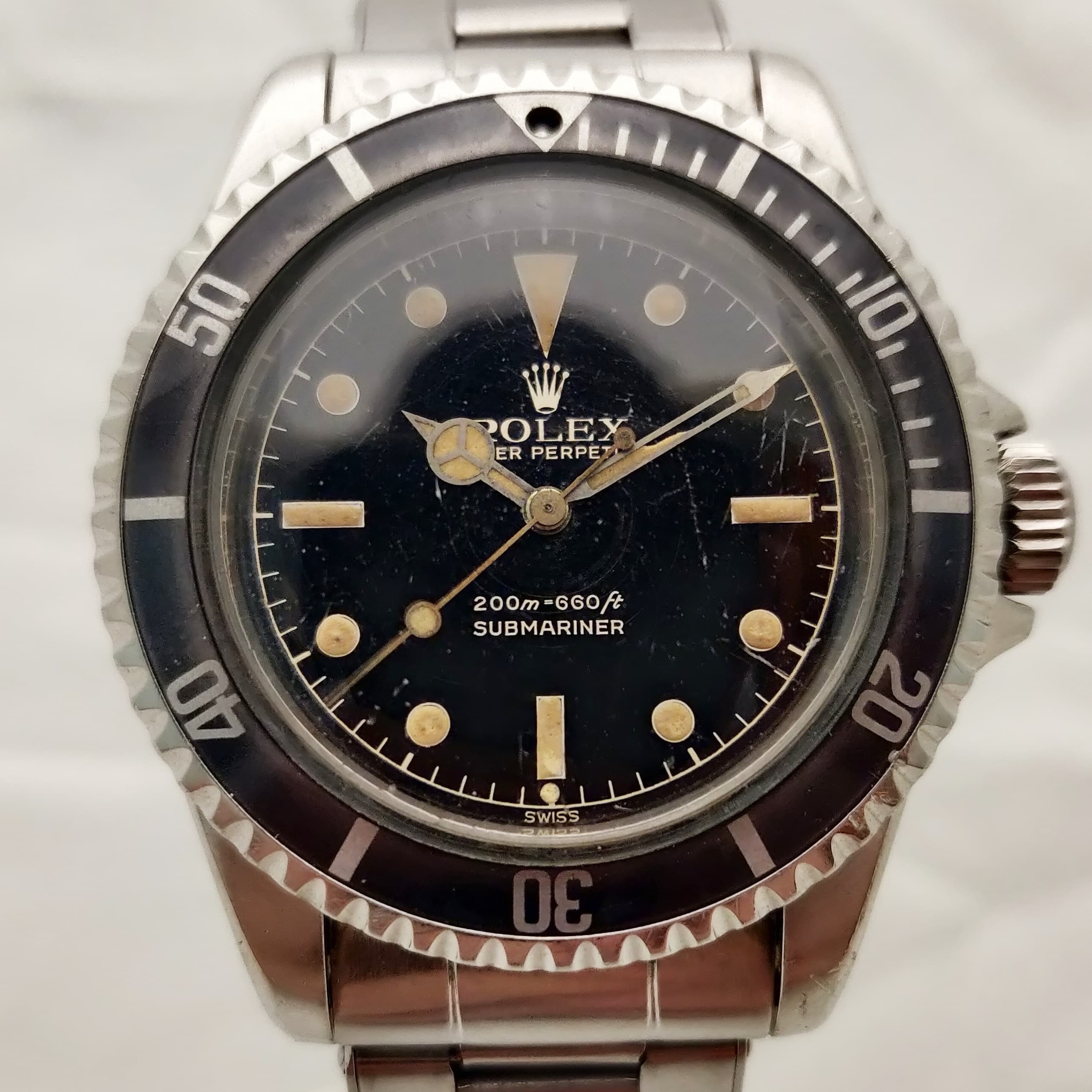 Reloj Rolex Submariner vintage acero inoxidable con bisel negro y esfera tropical en Joyería Recoleta