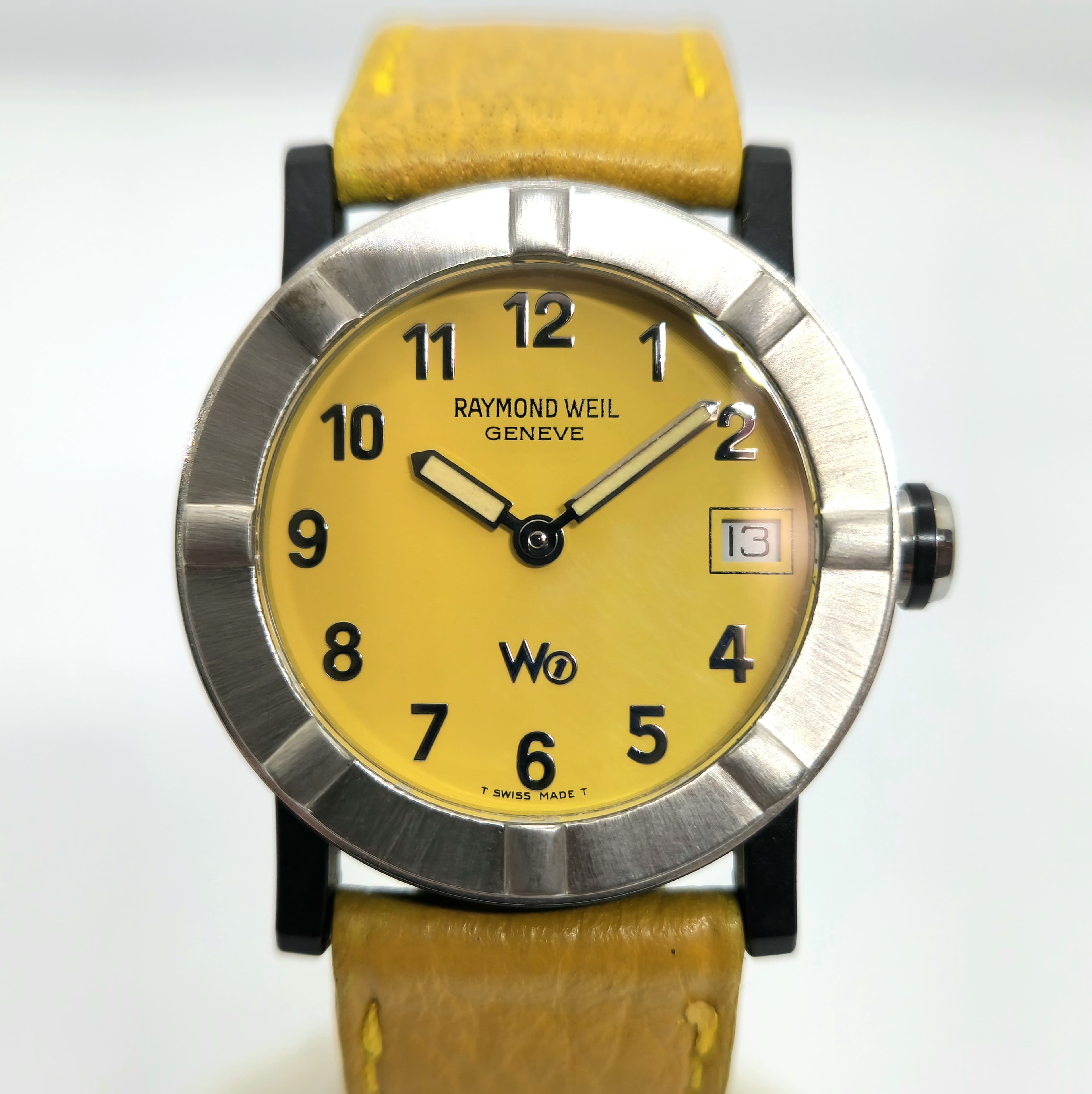 Reloj Raymond Weil W1 acero inoxidable esfera amarilla correa cuero en Joyería Recoleta