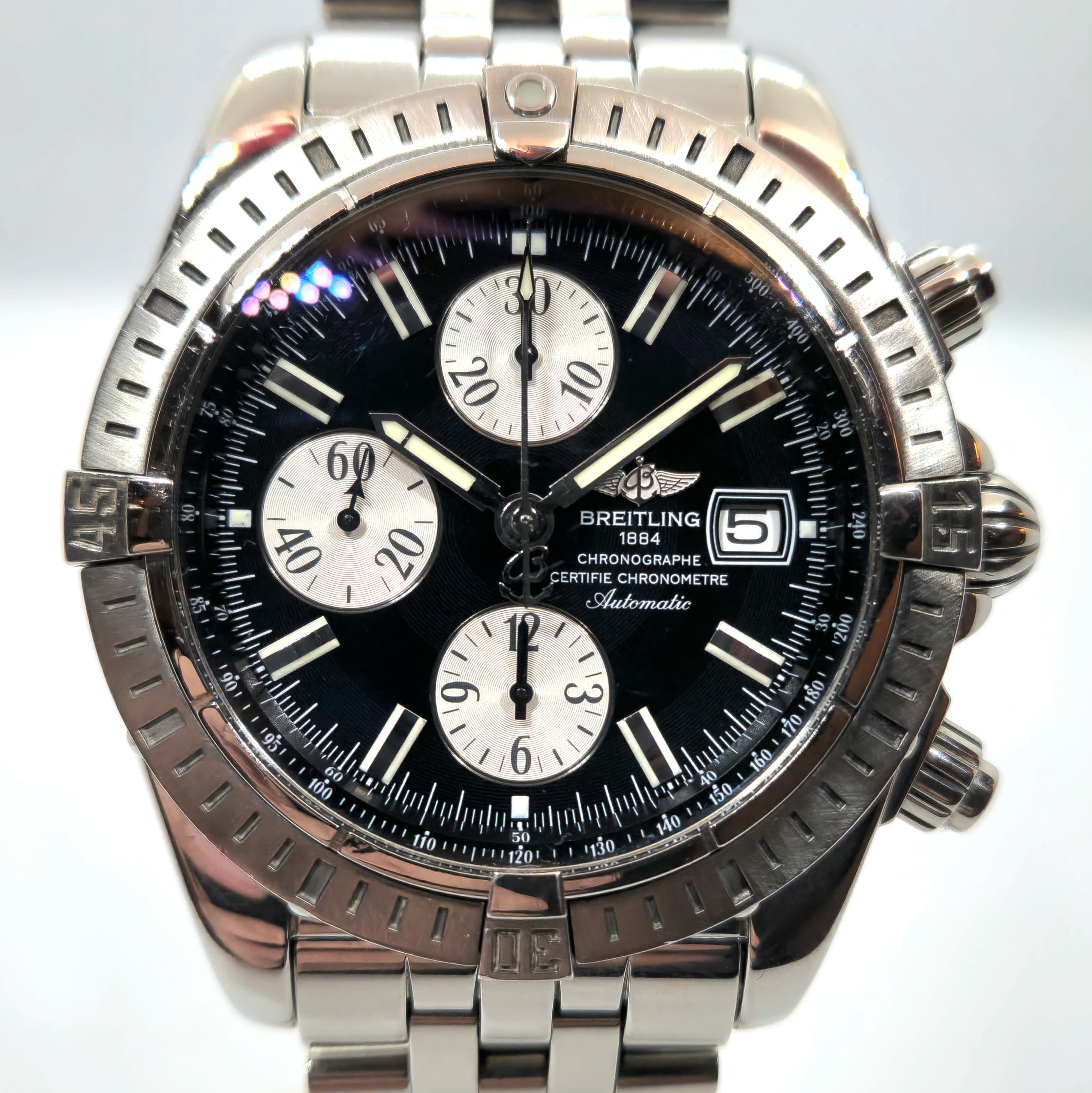 Reloj cronógrafo Breitling Chronomat Evolution 44 en acero inoxidable con esfera negra y subdiales plateados en Joyería Recoleta