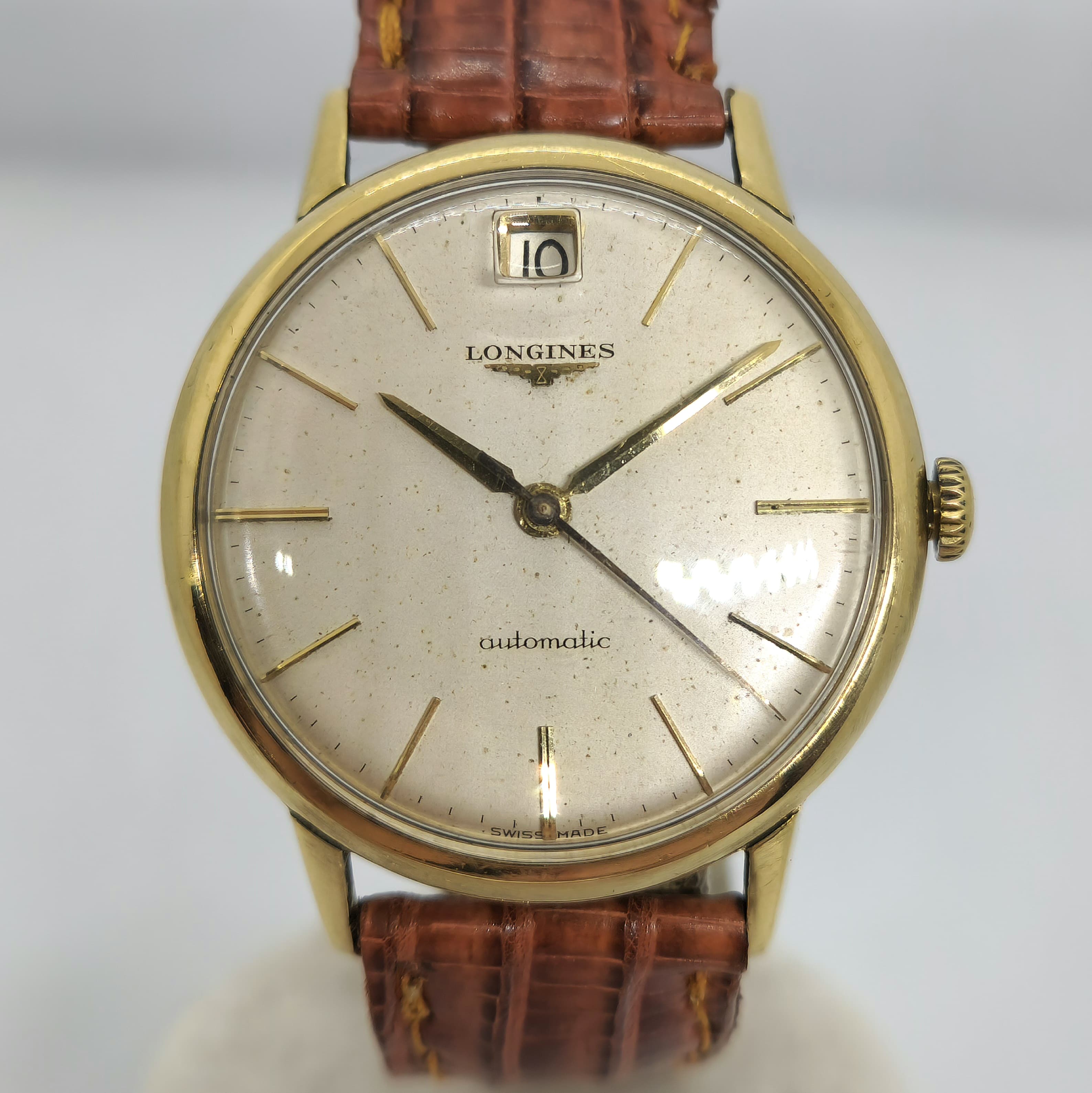 Reloj Longines automático vintage dorado con calendario y correa cuero en Joyería Recoleta