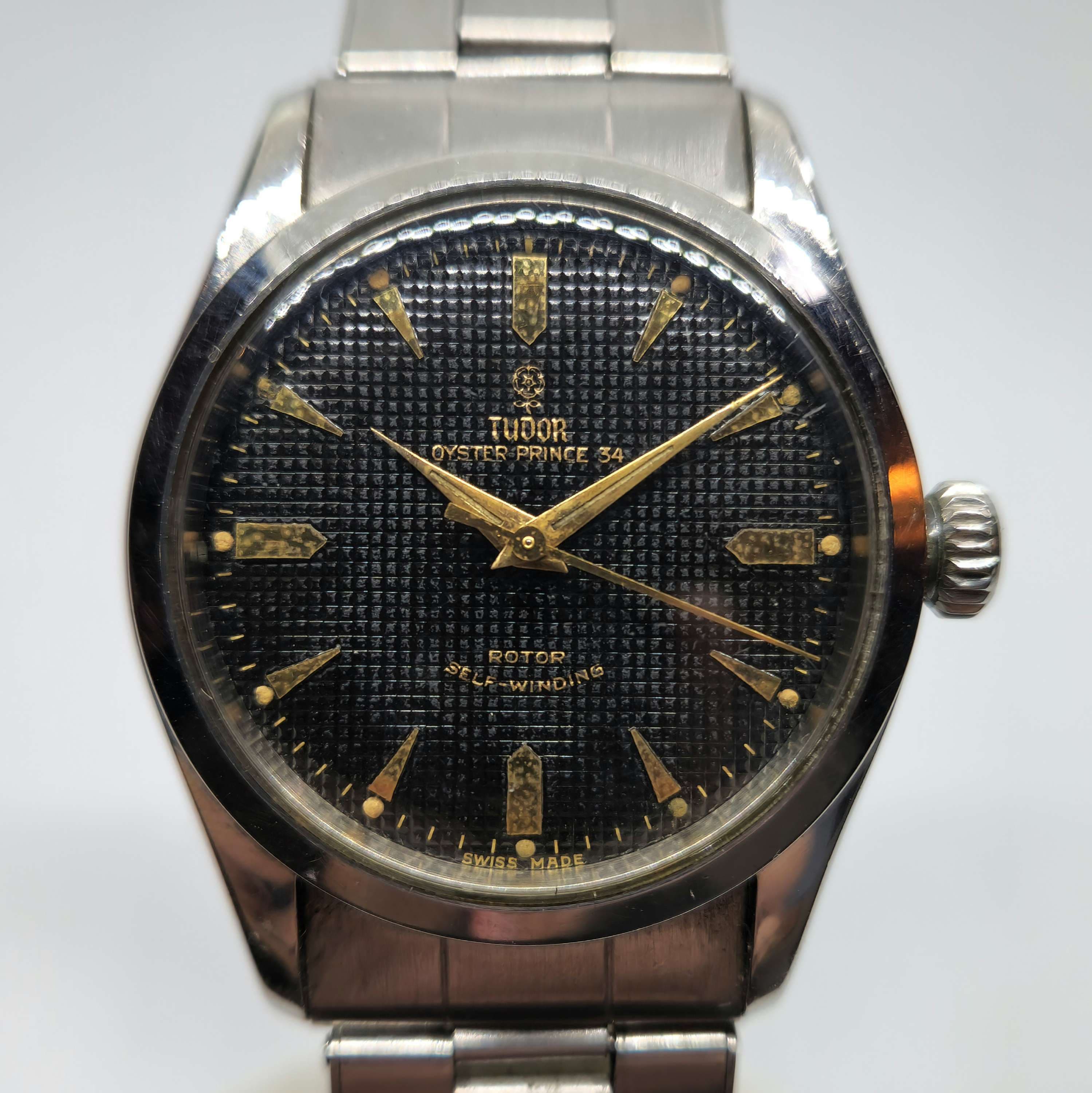 Reloj Tudor Oyster Prince 34 acero inoxidable esfera negra cuadriculada índices dorados en Joyería Recoleta