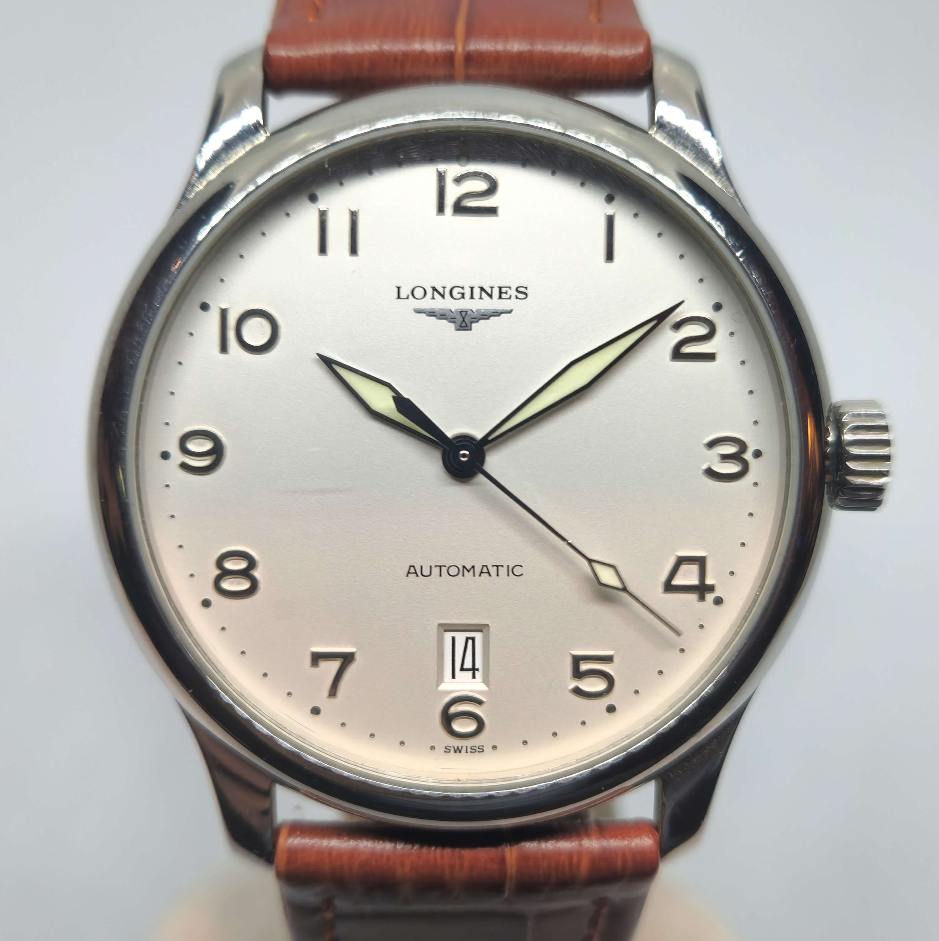 Reloj Longines Automatic acero plateado esfera crema y correa cuero marrón en Joyería Recoleta