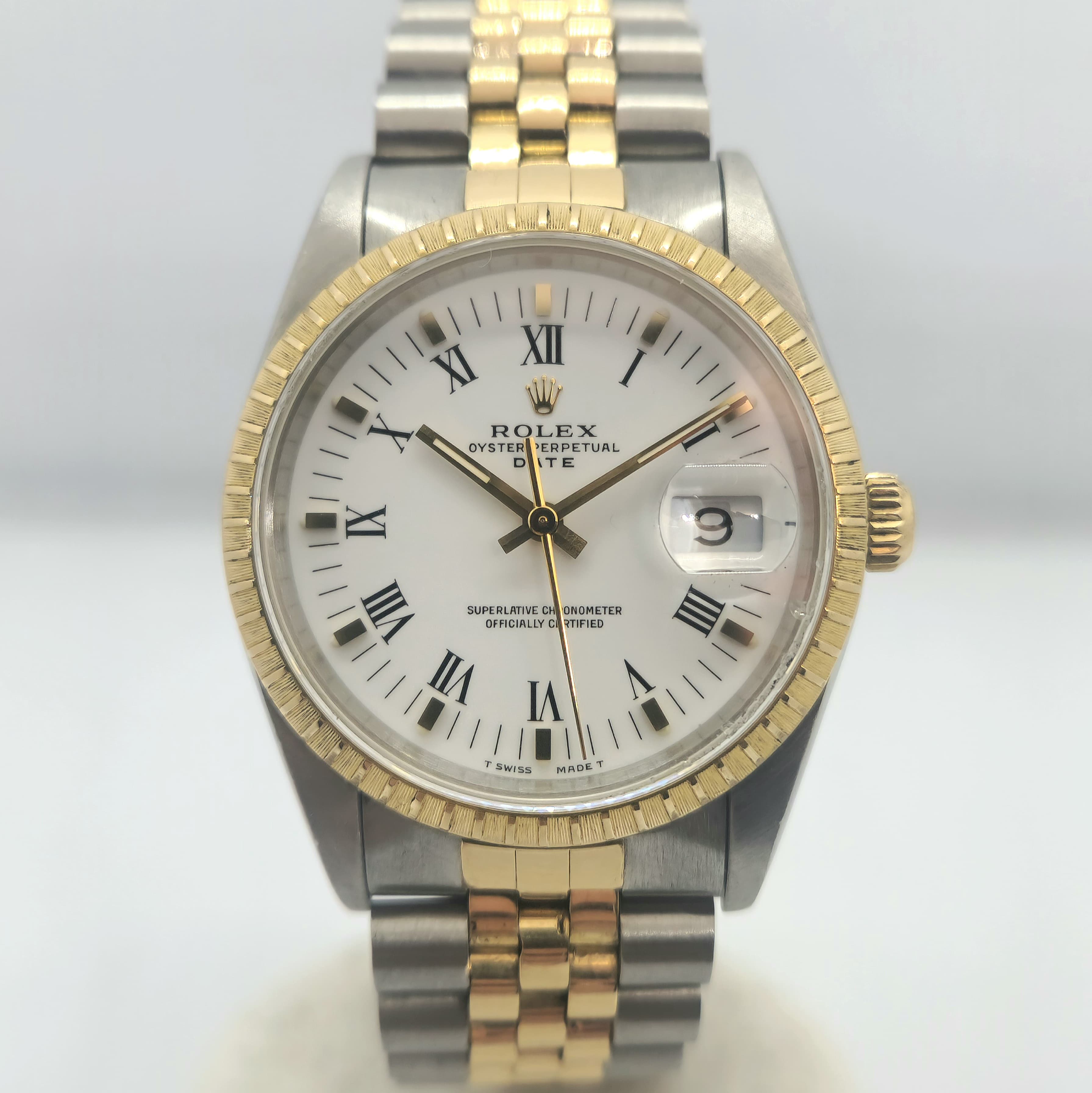 Reloj Rolex Oyster Perpetual Date bicolor acero y oro amarillo esfera blanca romana en Joyería Recoleta