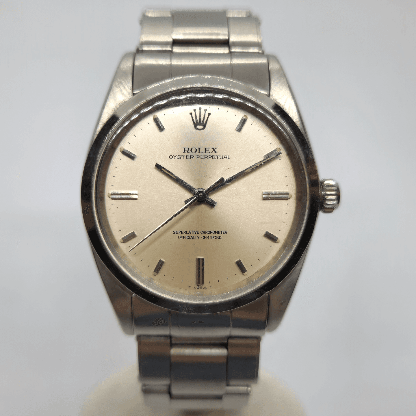 Reloj Rolex Oyster Perpetual acero inoxidable dial champagne índices baton vintage en Joyería Recoleta
