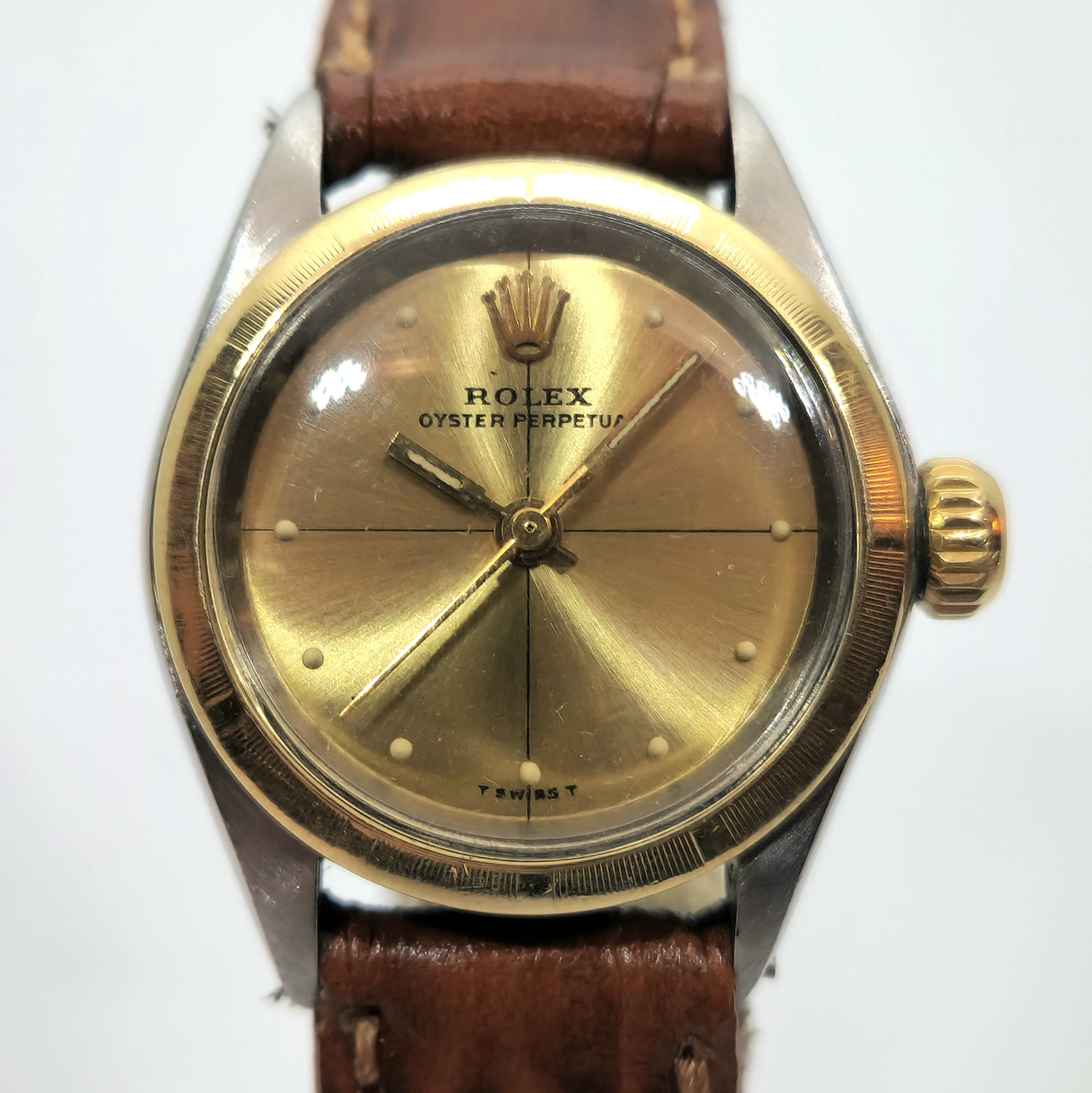 Reloj Rolex Oyster Perpetual vintage bicolor oro y acero con malla de cuero marrón en Joyería Recoleta