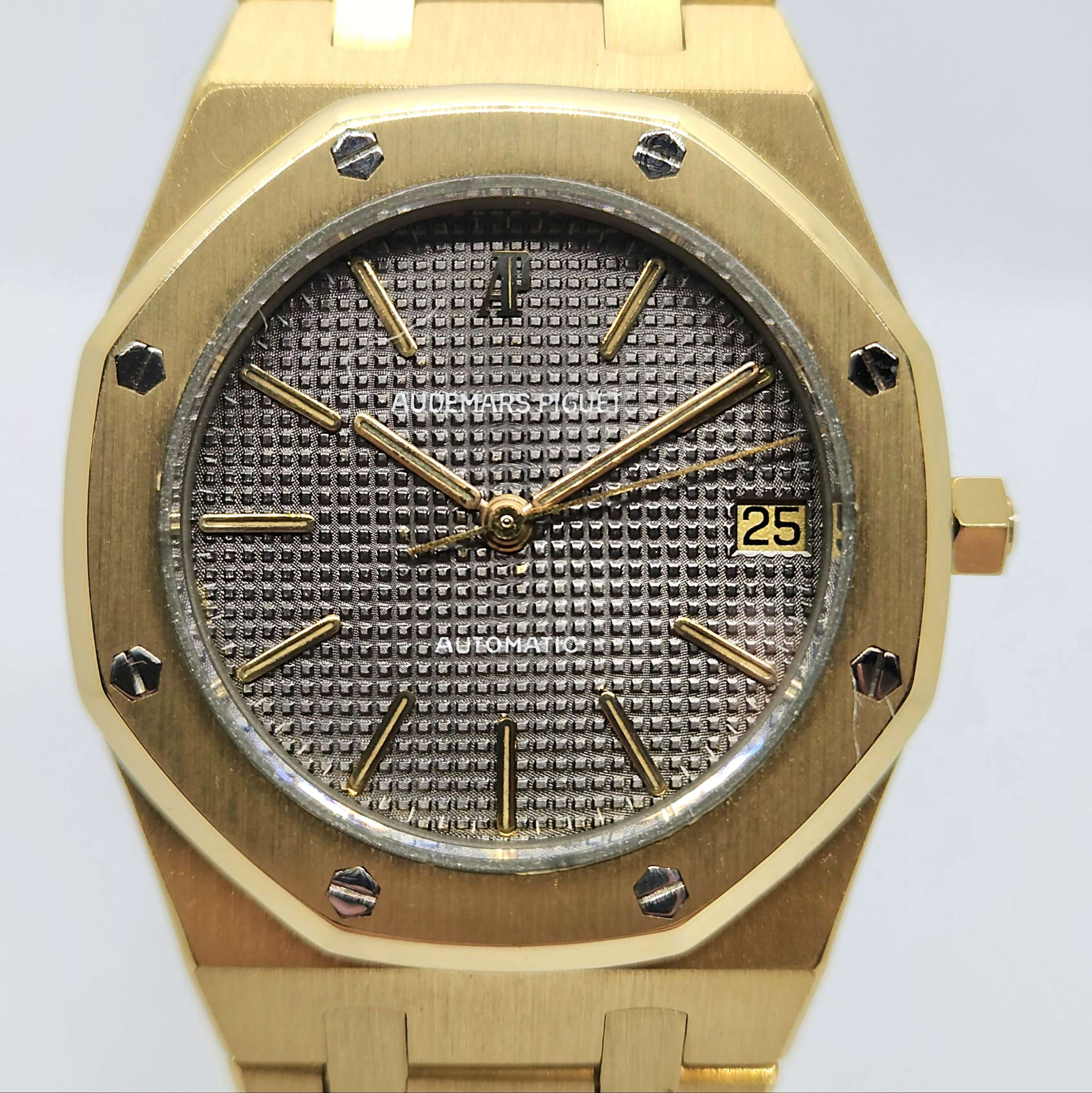 Reloj Audemars Piguet Royal Oak ref. 4100 en oro amarillo con esfera gris tapisserie en Joyería Recoleta.