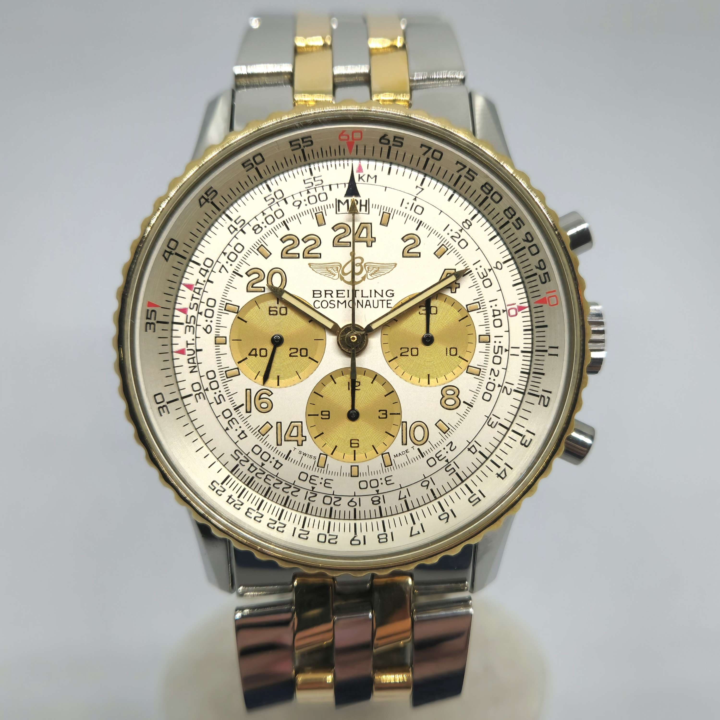Reloj Breitling Cosmonaute cronógrafo combinado acero y oro amarillo con esfera blanca en Joyería Recoleta