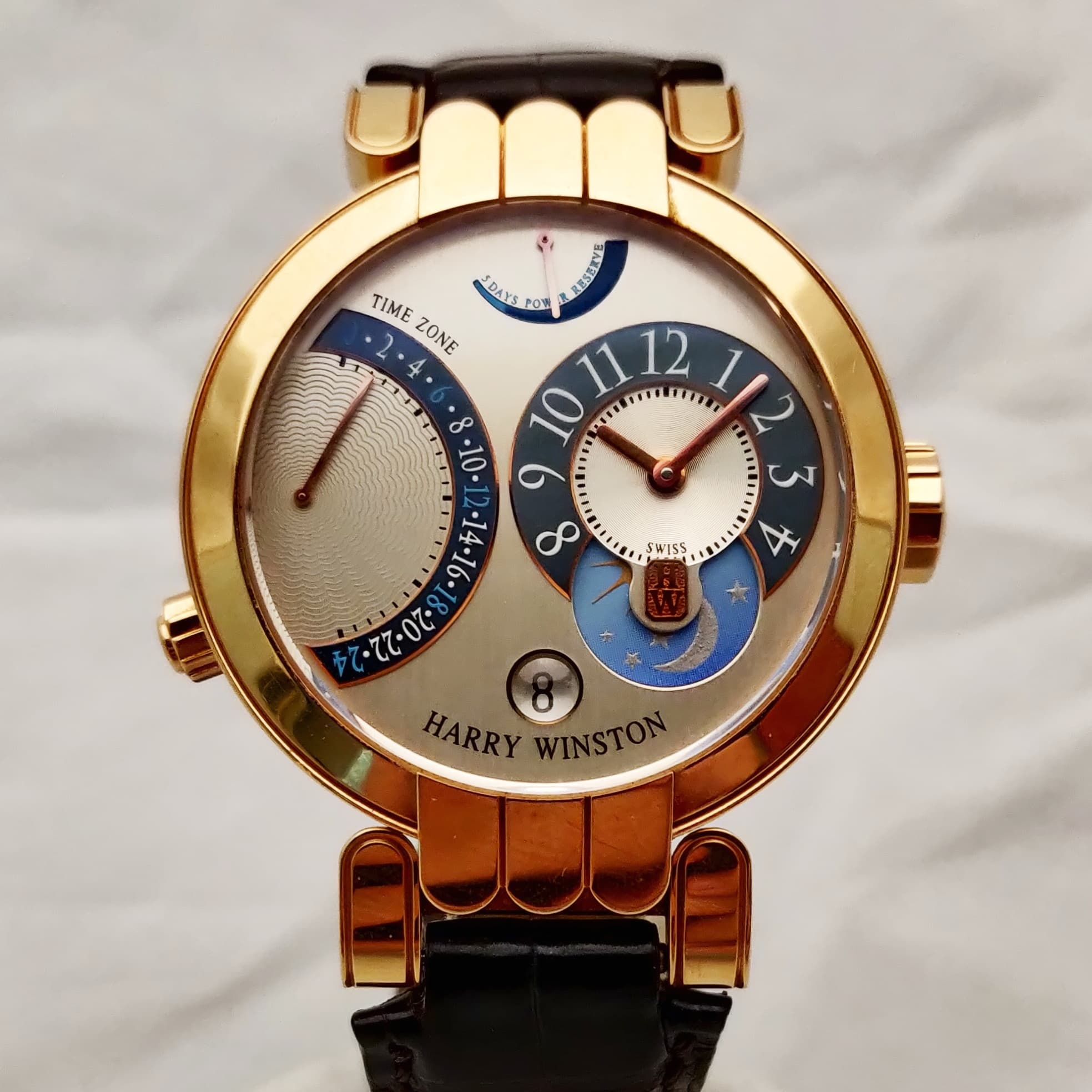 Reloj Harry Winston Premier Excenter en oro rosa con fase lunar y zona horaria en Joyería Recoleta