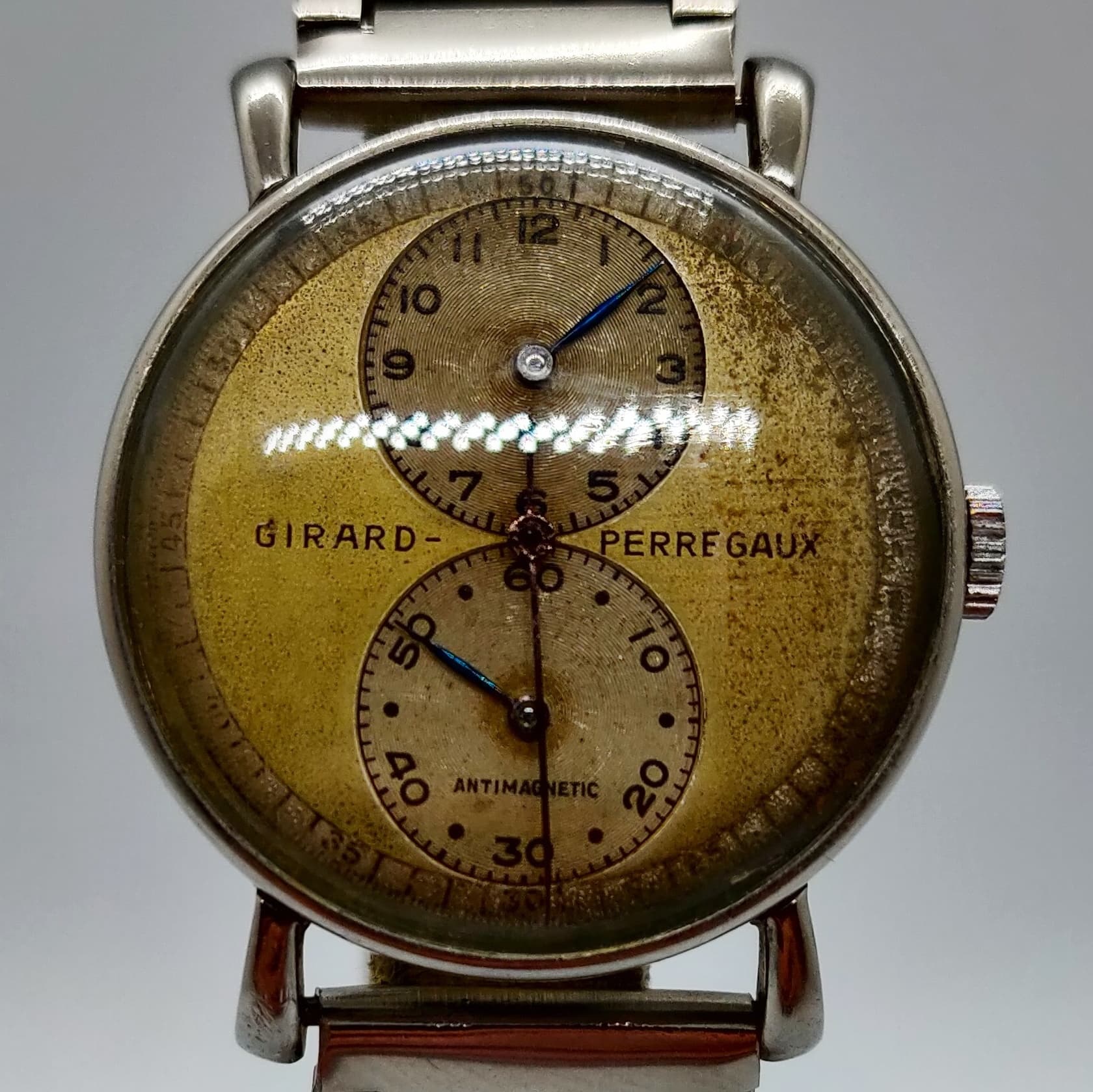 Reloj vintage Girard Perregaux Regulador acero años 30 con doble esfera dorada antimagnética en Joyería Recoleta