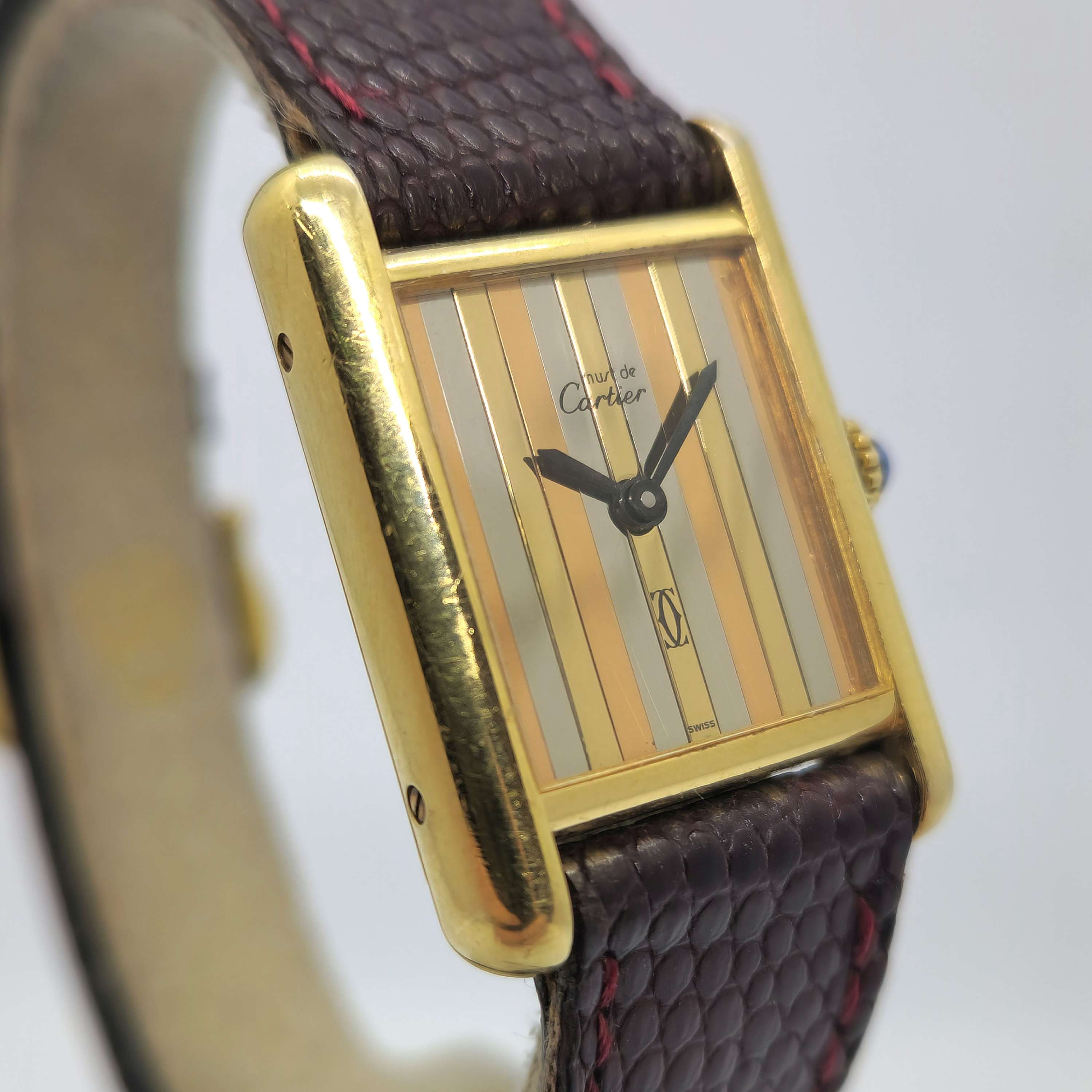 Reloj Must de Cartier Tank Vermeil dorado con esfera trinity tricolor y correa de cuero en Joyería Recoleta