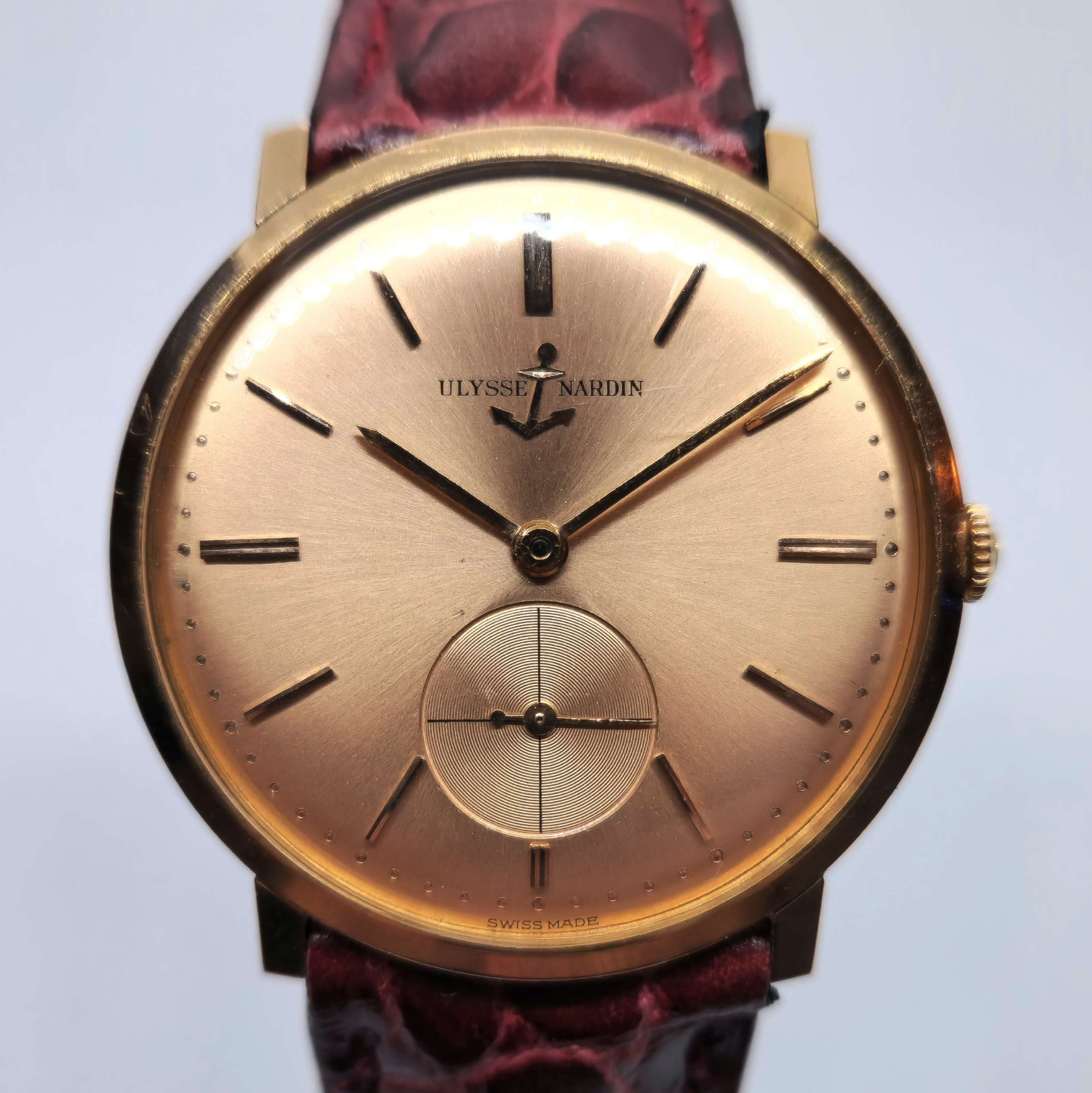 Reloj Ulysse Nardin Calatrava vintage en oro rosa con segundero pequeño y malla bordo en Joyería Recoleta