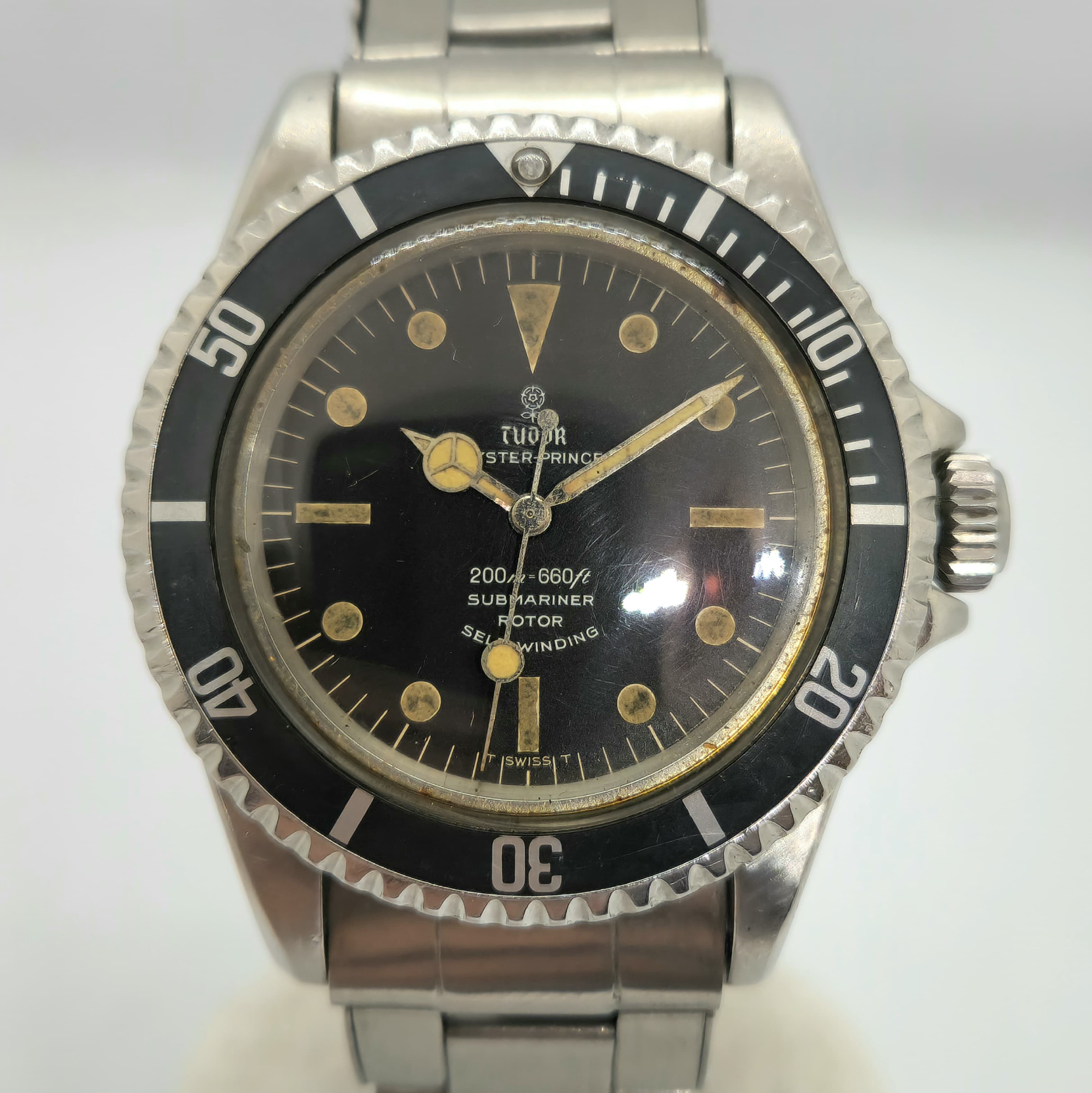 Reloj Tudor Submariner acero inoxidable dial negro indices dorados patinados en Joyería Recoleta