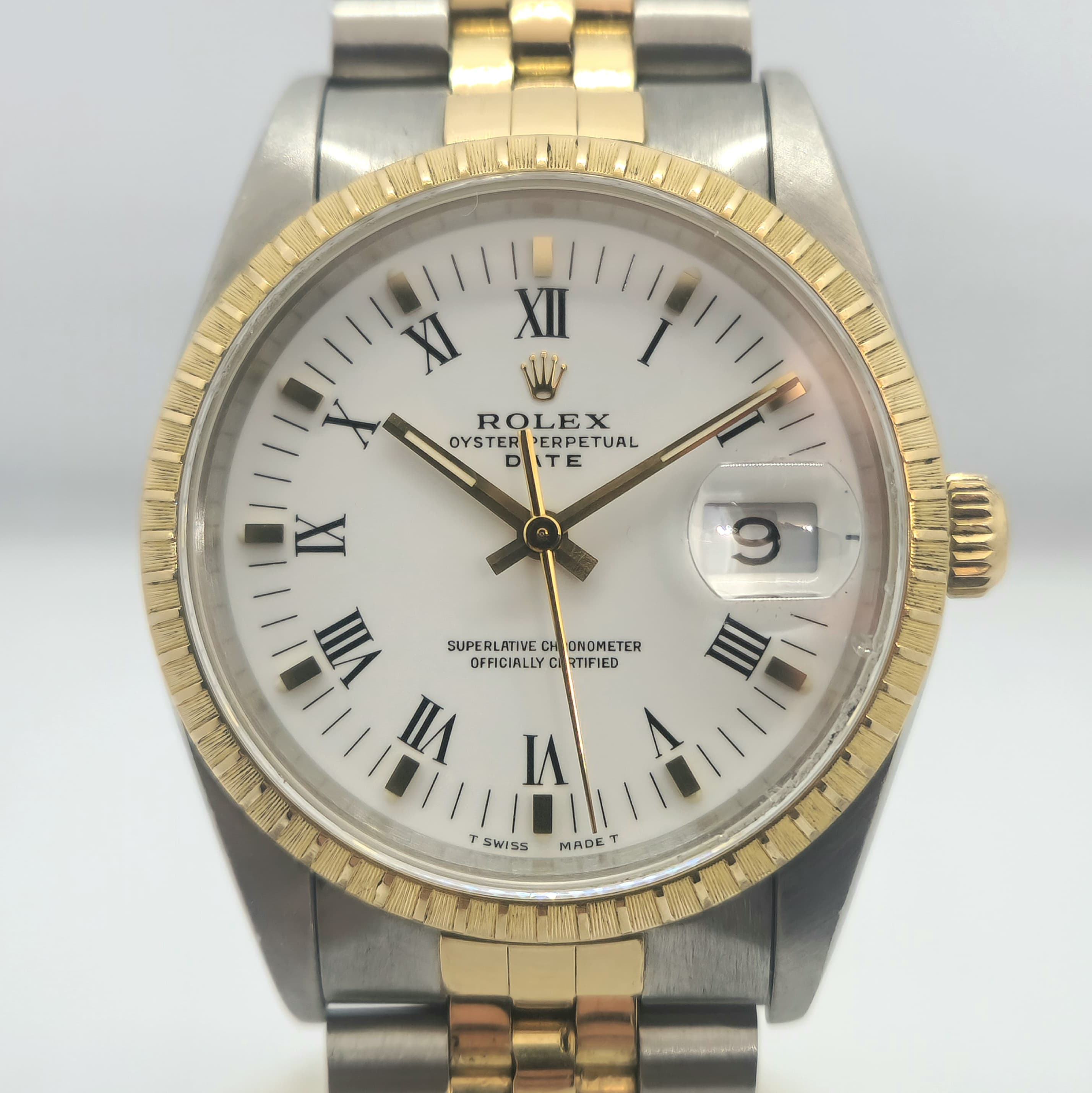 Reloj Rolex Oyster Perpetual Date bicolor acero y oro amarillo con esfera blanca romana en Joyería Recoleta