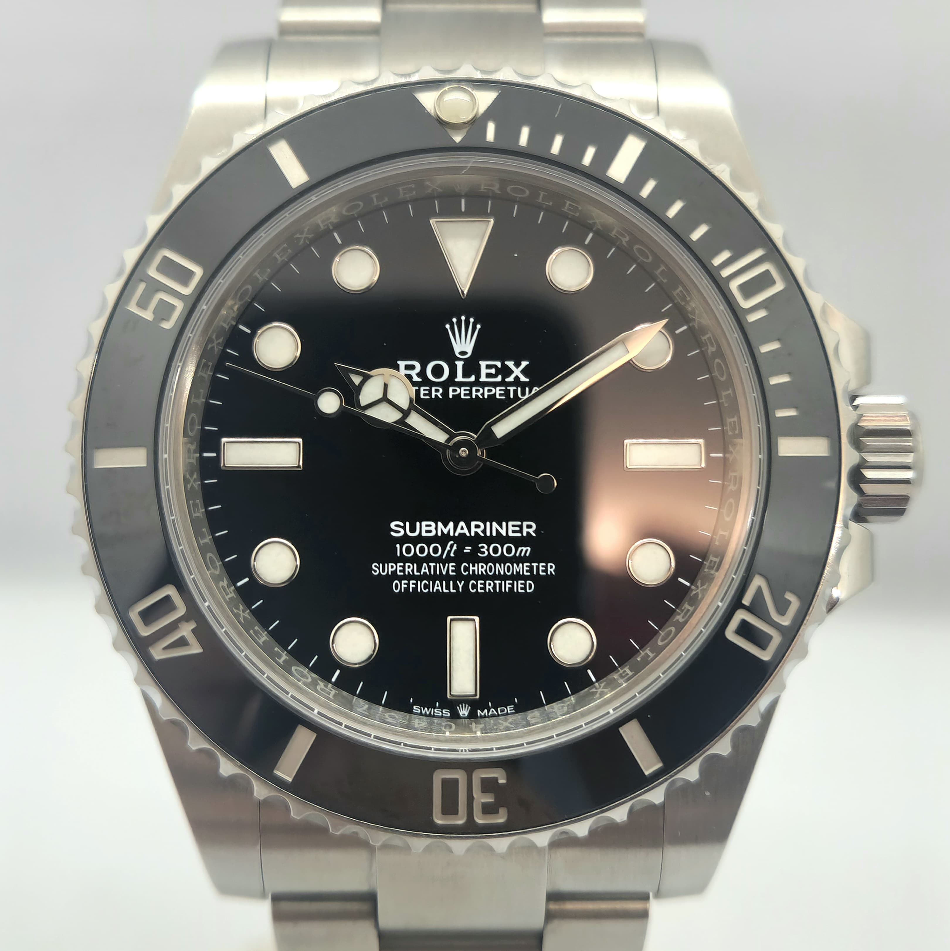 Reloj Rolex Submariner 124060 en acero inoxidable con bisel cerámico negro en Joyería Recoleta.