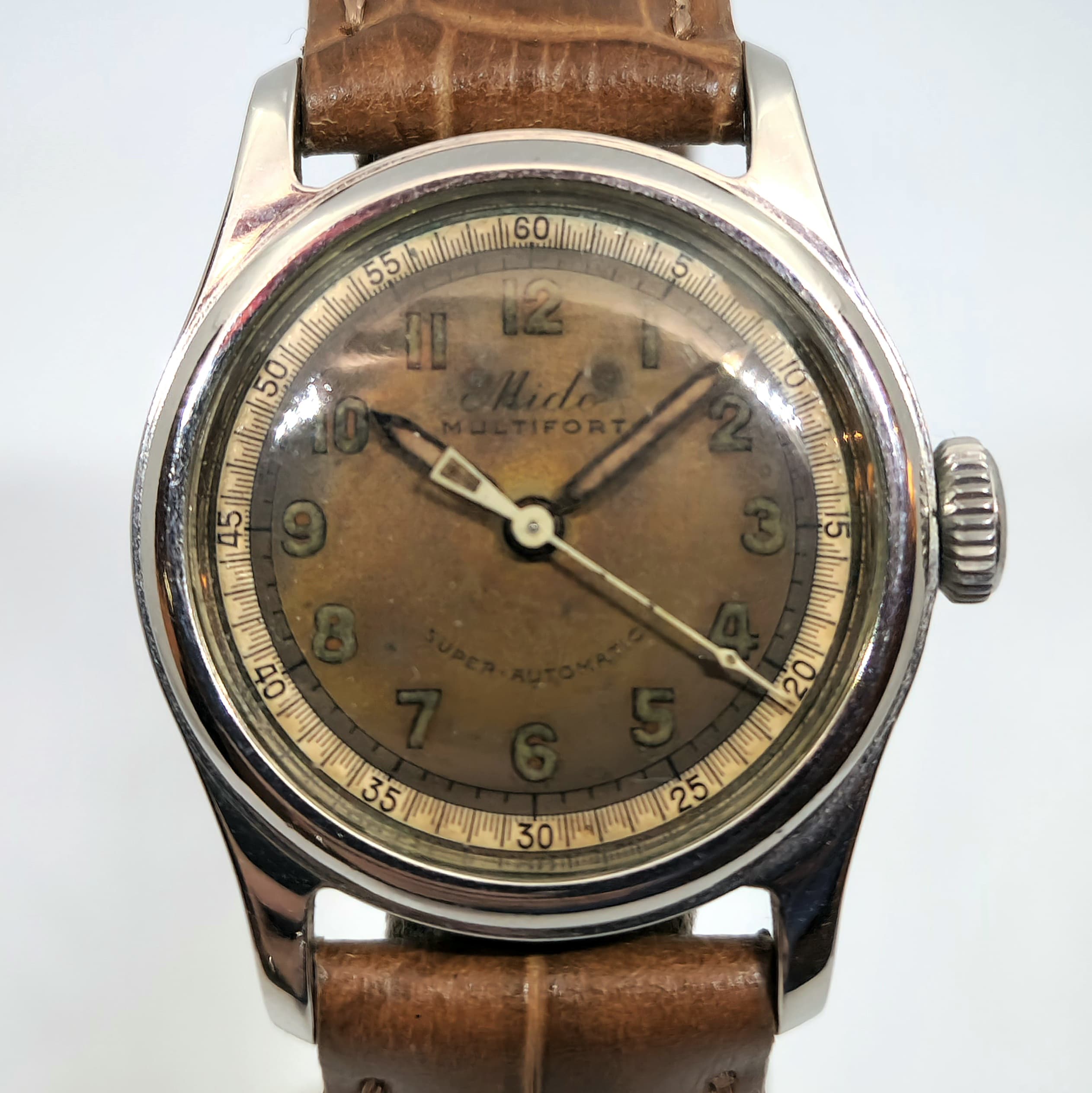 Reloj vintage Mido Multifort Super Automatic acero con esfera tropical y correa cuero marrón en Joyería Recoleta