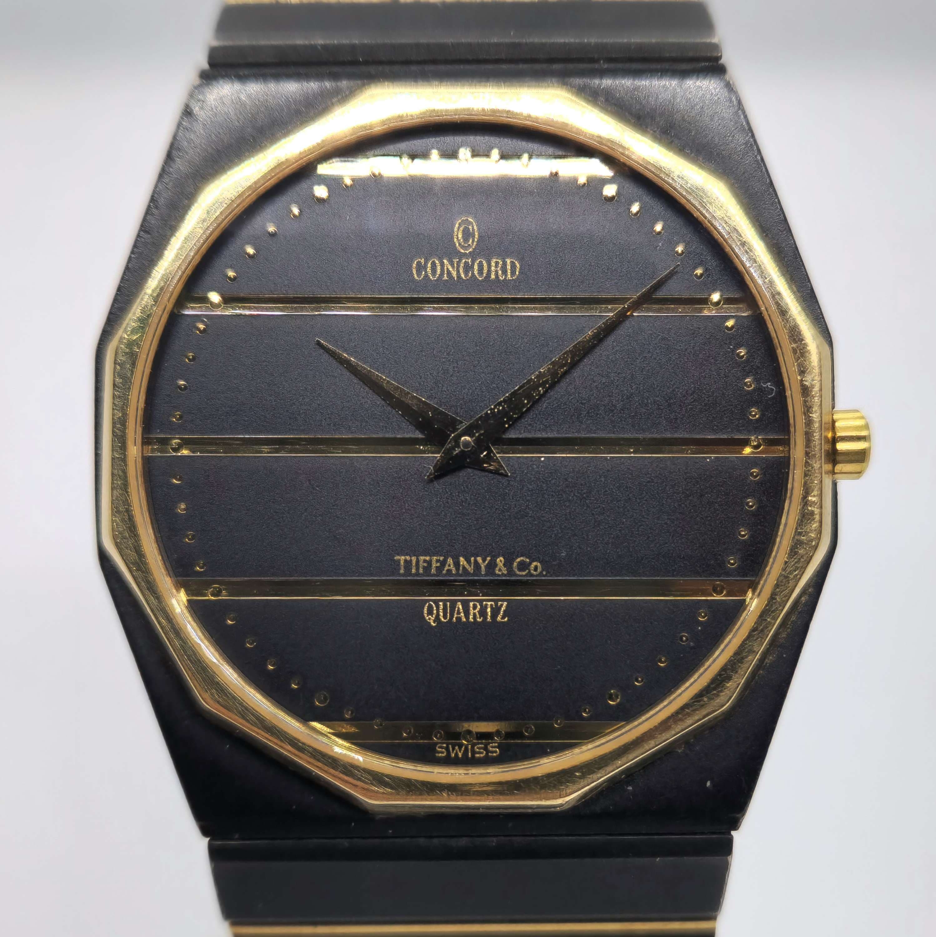 Reloj Concord Mariner bicolor negro y oro quartz Tiffany & Co en Joyería Recoleta